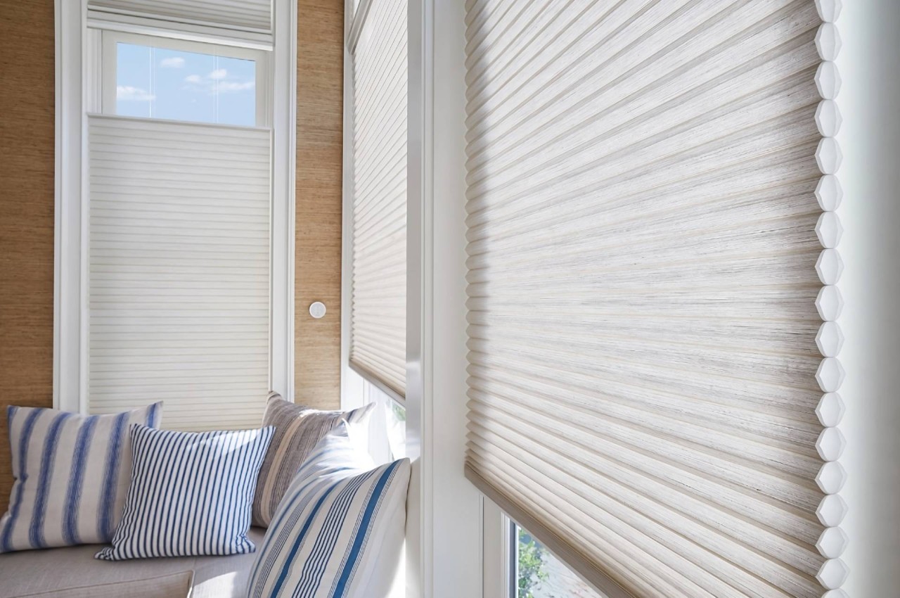 Energy Efficient Hunter Douglas Duette® Cellular Shades on living room windows beside a couch at Heber Valley Blinds near Midway, UT
